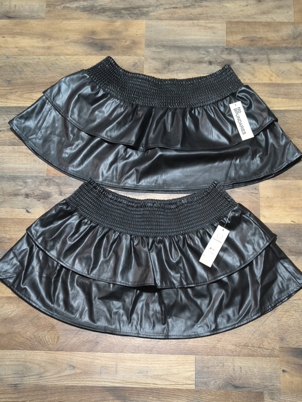 No Boundaries Black Faux Leather Ruffle Mini Skirt with Smocked Waist